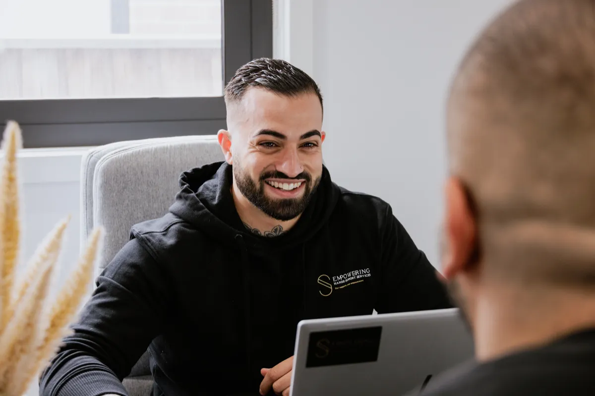 Team meeting or planning session, showing continuity of care